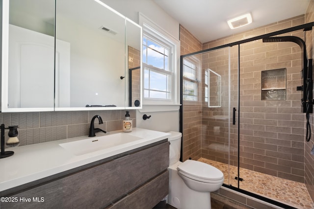 333 N Island Xing, Edenton, NC 27932 - full bath with a shower stall, vanity, backsplash, toilet, and visible vents