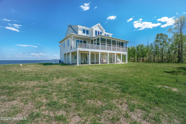 333 N Island Xing, Edenton, NC 27932 - back of property featuring a patio area, a sunroom, a water view, and a yard