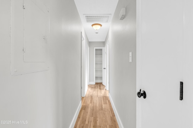 6203 Lynette Cir, Fayetteville, NC 28314 - corridor with light wood-type flooring, baseboards, and electric panel