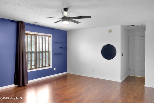 214 Target Ln, Hubert, NC 28539 - unfurnished room featuring ceiling fan, wood finished floors, and baseboards
