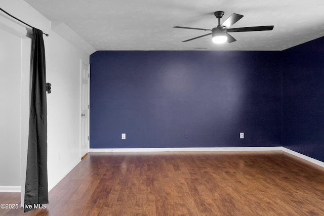 214 Target Ln, Hubert, NC 28539 - spare room featuring wood finished floors, ceiling fan, and baseboards