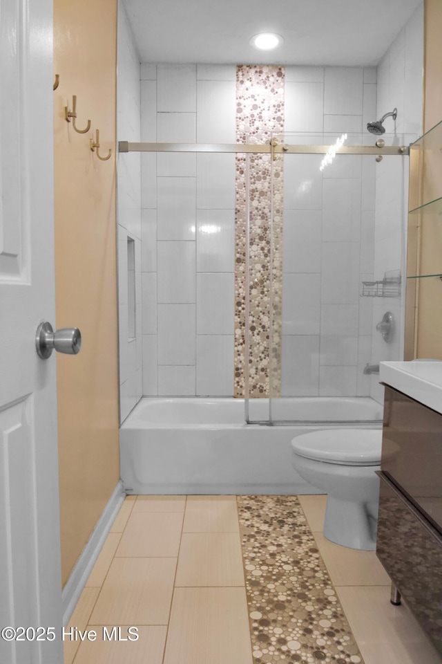 214 Target Ln, Hubert, NC 28539 - bathroom with tub / shower combination, toilet, vanity, baseboards, and tile patterned floors
