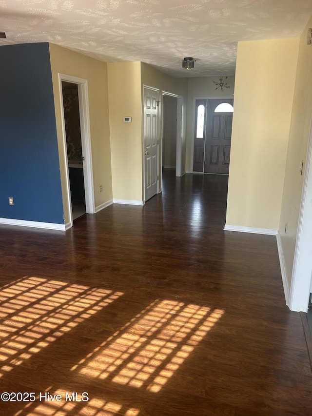 214 Target Ln, Hubert, NC 28539 - unfurnished room featuring baseboards and wood finished floors