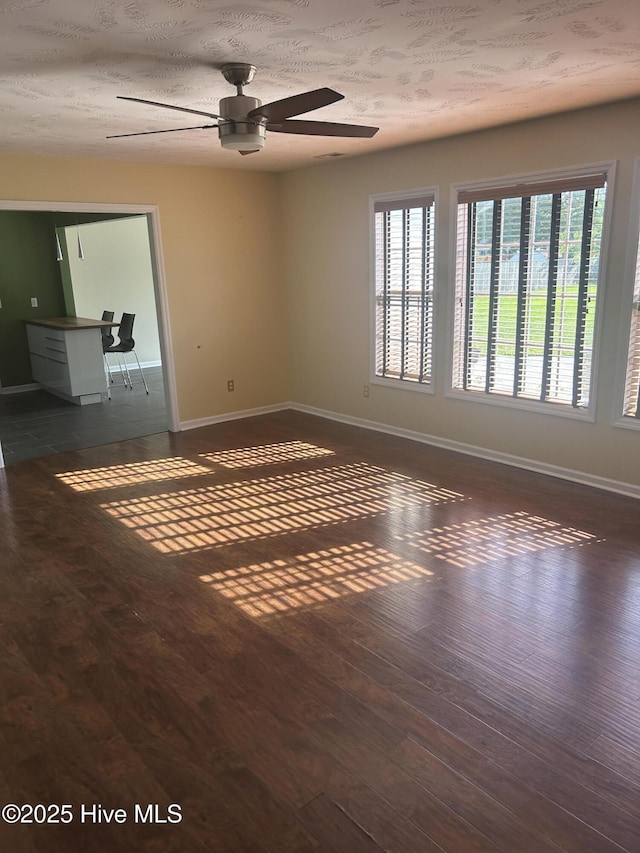 214 Target Ln, Hubert, NC 28539 - spare room with baseboards, wood finished floors, and a ceiling fan