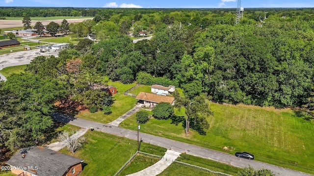 drone / aerial view with a view of trees