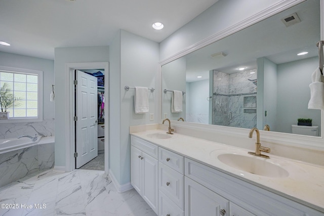 full bath featuring a sink, a marble finish shower, marble finish floor, and visible vents
