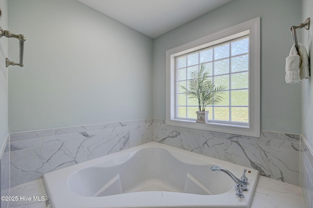 full bath featuring a garden tub