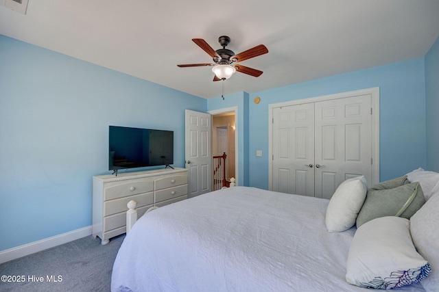 bedroom featuring carpet floors, visible vents, a closet, baseboards, and ceiling fan
