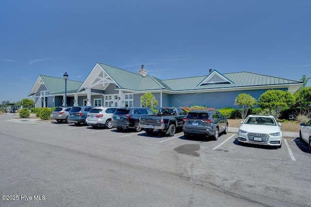 view of property with uncovered parking