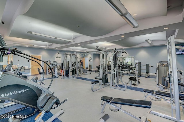 workout area featuring recessed lighting