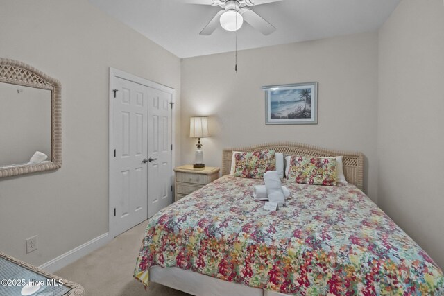 908 Resort Cir Unit 701, Sunset Beach, NC 28468 - carpeted bedroom featuring ceiling fan, baseboards, and a closet