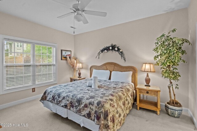 908 Resort Cir Unit 701, Sunset Beach, NC 28468 - bedroom featuring carpet flooring, baseboards, and ceiling fan