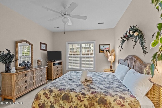 908 Resort Cir Unit 701, Sunset Beach, NC 28468 - bedroom featuring visible vents, light colored carpet, and multiple windows