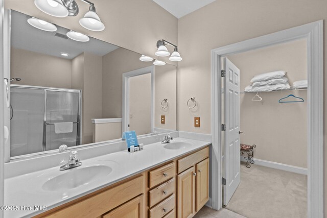 908 Resort Cir Unit 701, Sunset Beach, NC 28468 - full bathroom featuring an enclosed shower, a sink, and double vanity