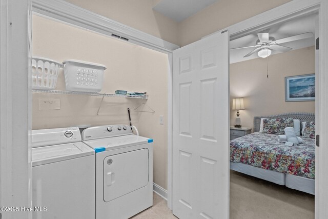 908 Resort Cir Unit 701, Sunset Beach, NC 28468 - washroom featuring light tile patterned floors, washer and dryer, laundry area, and ceiling fan