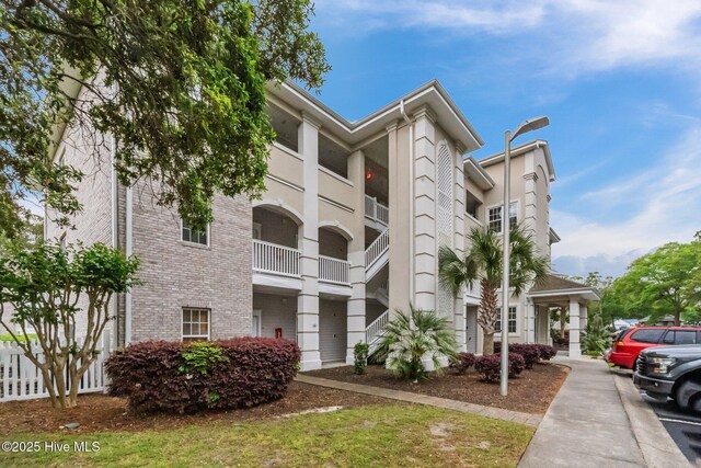 908 Resort Cir Unit 701, Sunset Beach, NC 28468 - view of building exterior