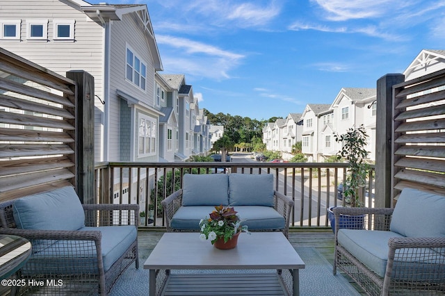 balcony with a residential view and outdoor lounge area