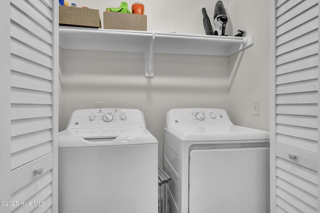 laundry area featuring laundry area and washer and dryer