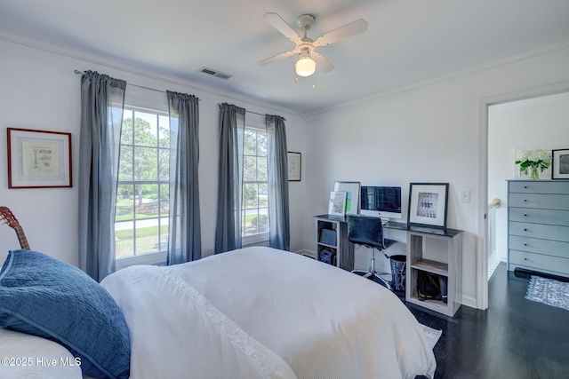 7240 Orchard Trce, Wilmington, NC 28409 - bedroom with baseboards, dark wood-style floors, visible vents, a ceiling fan, and crown molding