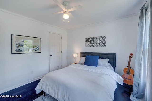 7240 Orchard Trce, Wilmington, NC 28409 - bedroom with ornamental molding, a ceiling fan, wood finished floors, and baseboards