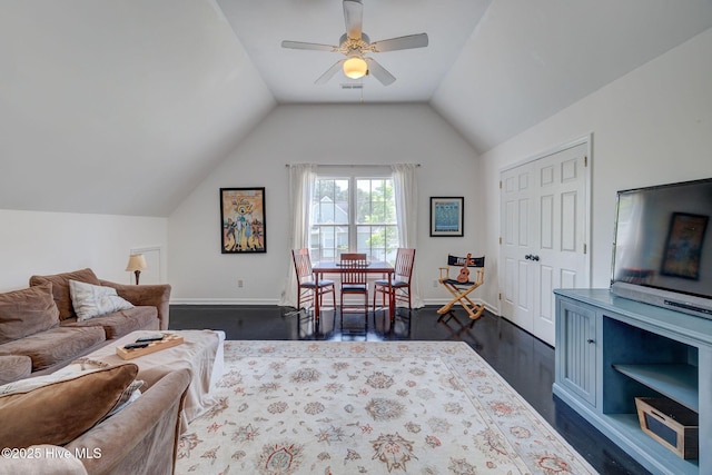 7240 Orchard Trce, Wilmington, NC 28409 - living area with baseboards, ceiling fan, dark wood-style flooring, and vaulted ceiling
