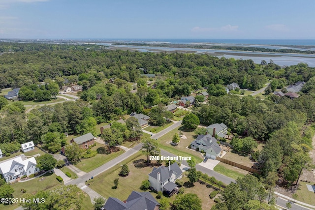 7240 Orchard Trce, Wilmington, NC 28409 - drone / aerial view with a wooded view, a residential view, and a water view