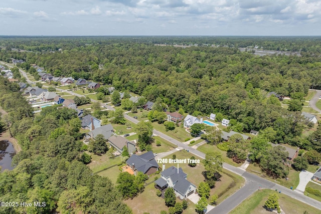 7240 Orchard Trce, Wilmington, NC 28409 - drone / aerial view featuring a residential view and a forest view