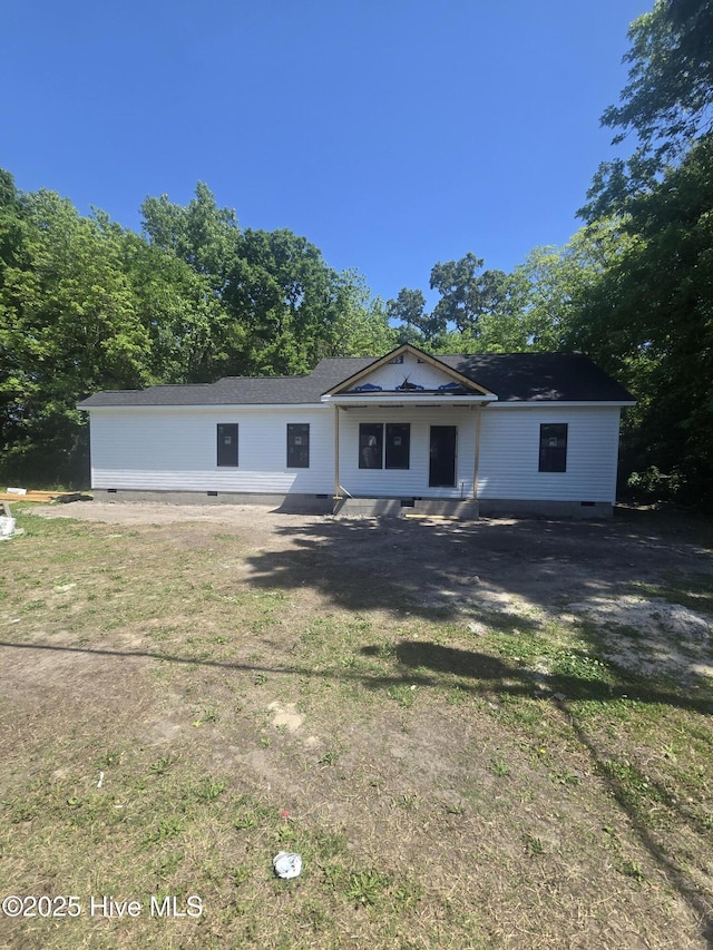 view of front of home featuring crawl space