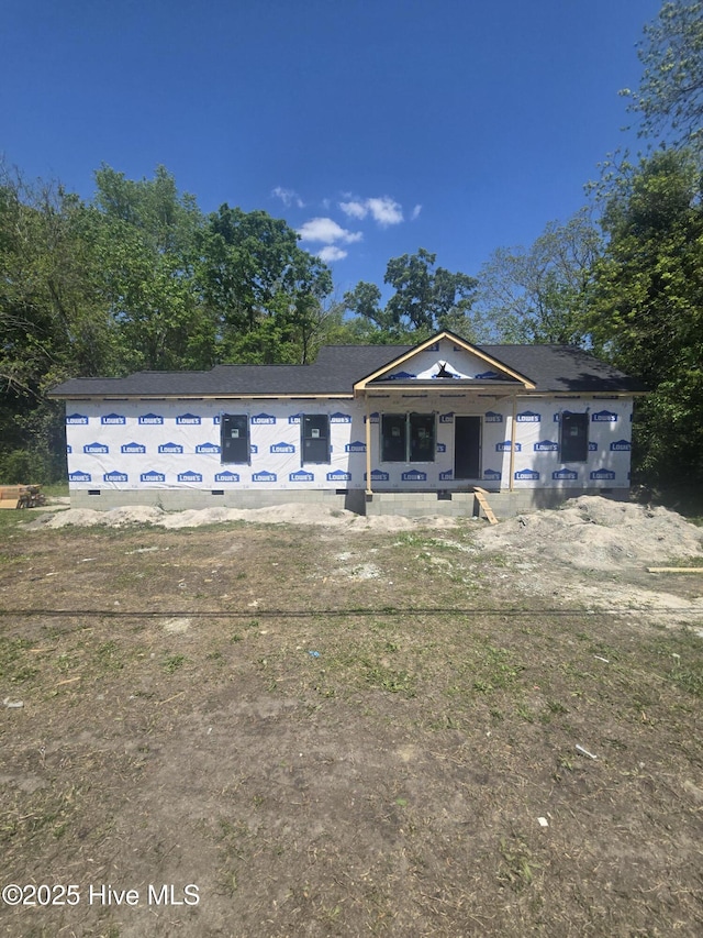 property under construction featuring covered porch