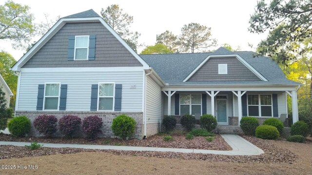 112 Schever Rd, West End, NC 27376 - craftsman-style home featuring covered porch