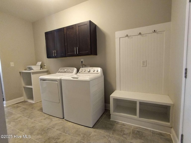 112 Schever Rd, West End, NC 27376 - laundry room featuring washer and dryer, cabinet space, light tile patterned flooring, and baseboards