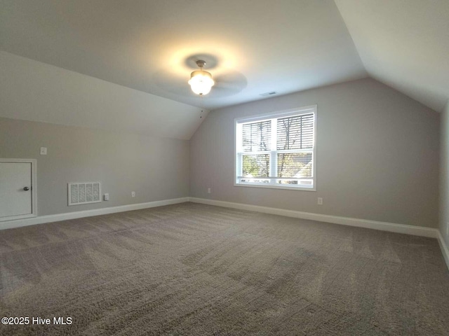 112 Schever Rd, West End, NC 27376 - bonus room with vaulted ceiling, baseboards, and carpet floors