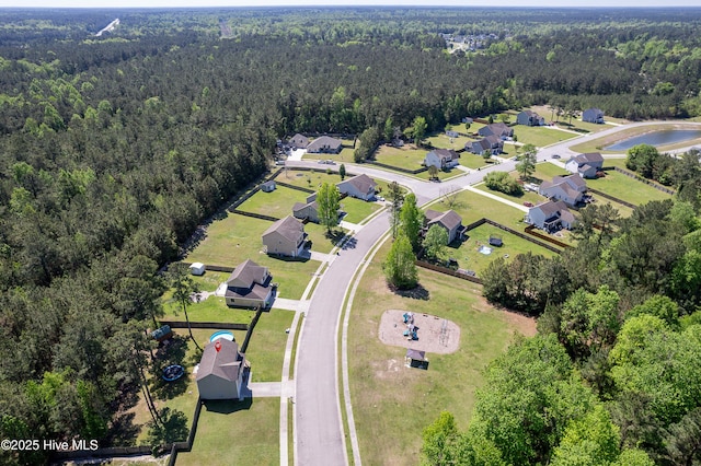 bird's eye view featuring a view of trees