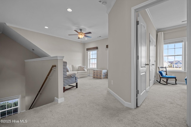 hallway featuring an upstairs landing, carpet, crown molding, plenty of natural light, and recessed lighting
