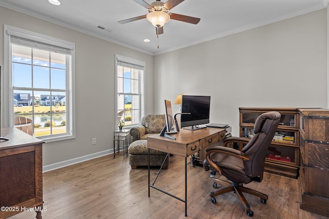 office space with ceiling fan, baseboards, wood finished floors, ornamental molding, and recessed lighting