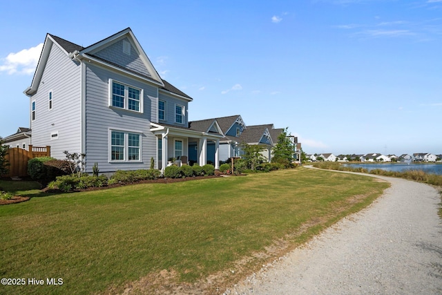 view of front facade with a water view