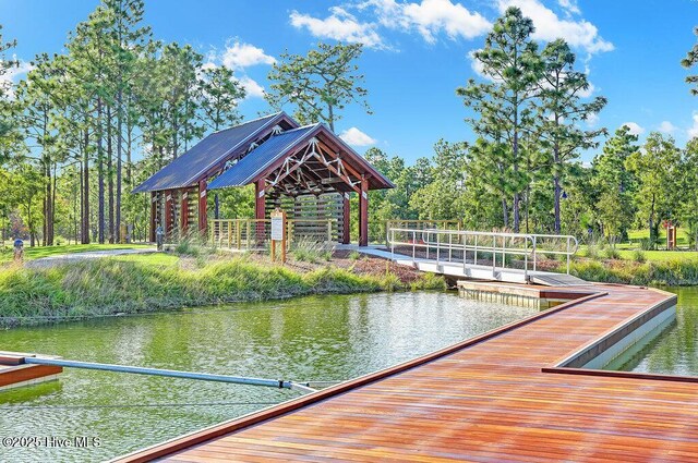 4751 Waves Pointe Pointe, Wilmington, NC 28412 - dock featuring a water view and view of wooded area