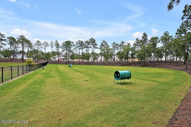 view of home's community featuring a dog friendly area