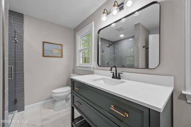 bathroom featuring visible vents, a tile shower, baseboards, toilet, and marble finish floor