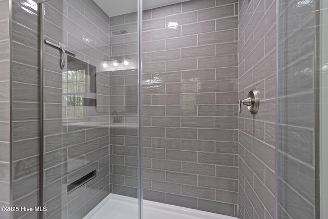 full bath featuring a stall shower