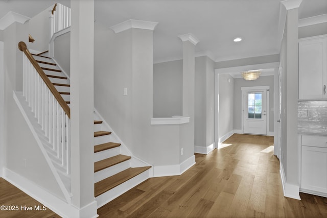 4434 Old Towne St, Wilmington, NC 28412 - entryway featuring stairway, wood finished floors, baseboards, ornamental molding, and recessed lighting