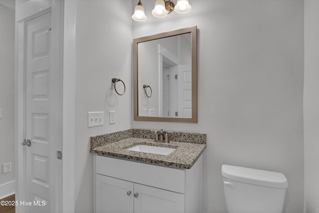 4434 Old Towne St, Wilmington, NC 28412 - half bathroom featuring vanity, toilet, and a chandelier
