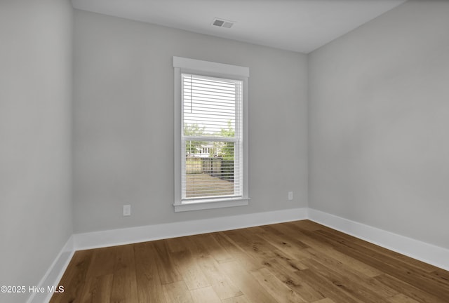 4434 Old Towne St, Wilmington, NC 28412 - empty room with wood finished floors and baseboards