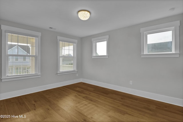 4434 Old Towne St, Wilmington, NC 28412 - spare room with baseboards and wood finished floors