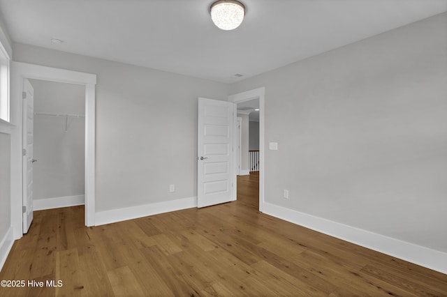 4434 Old Towne St, Wilmington, NC 28412 - unfurnished bedroom with wood finished floors and baseboards