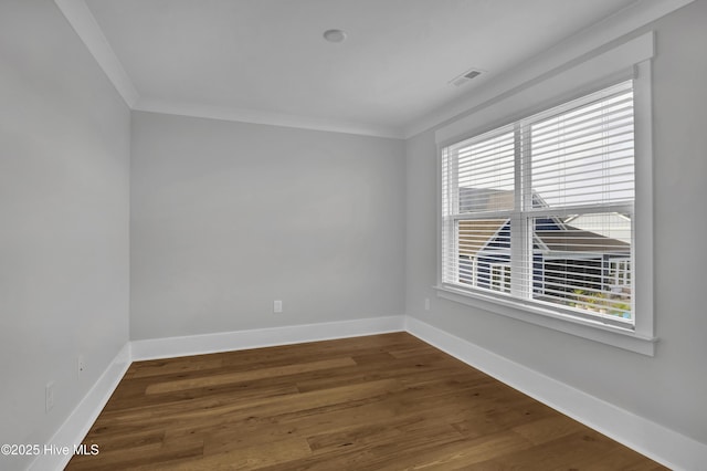 4434 Old Towne St, Wilmington, NC 28412 - empty room with ornamental molding, wood finished floors, and baseboards