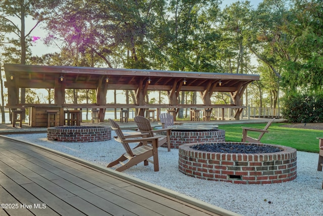 4434 Old Towne St, Wilmington, NC 28412 - wooden terrace featuring a fire pit and a gazebo
