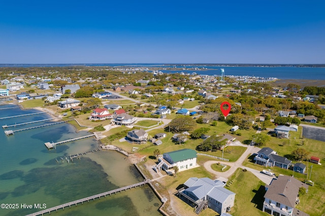 aerial view featuring a water view and a residential view