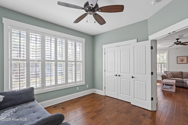 6460 Carrick Bend Trl SW, Ocean Isle Beach, NC 28469 - living area with ceiling fan and wood finished floors