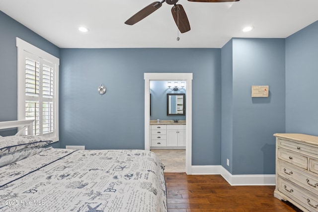6460 Carrick Bend Trl SW, Ocean Isle Beach, NC 28469 - bedroom with wood finished floors, ensuite bath, ceiling fan, and recessed lighting